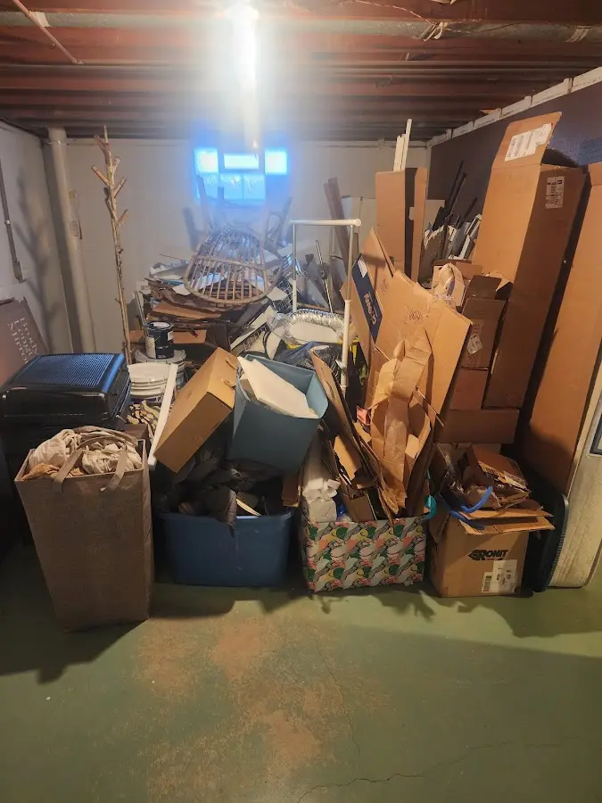 Roll-off dumpster container at job site for 2 Yard Dumpster Rental in Carlsbad